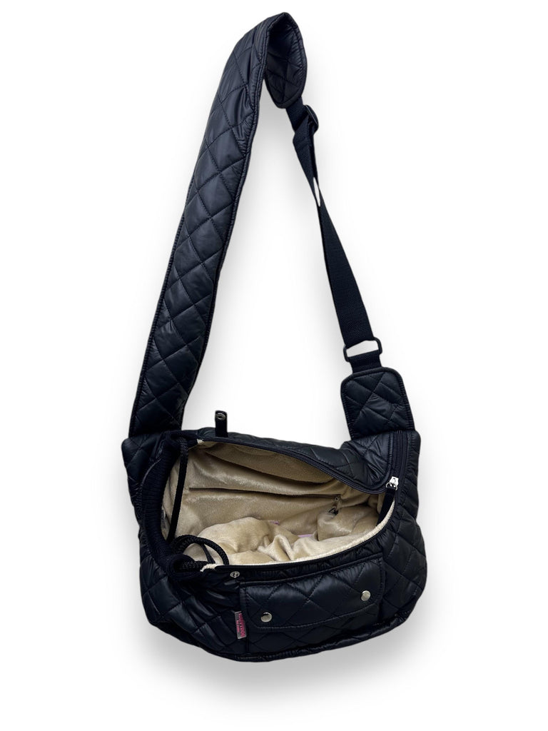 Inside view of small dog carrier with safety leash and inner pocket